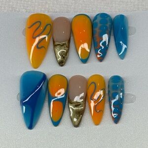 Colorful Nail Art Set with Blue and Orange Accents